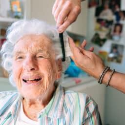 Senior woman getting a haircut