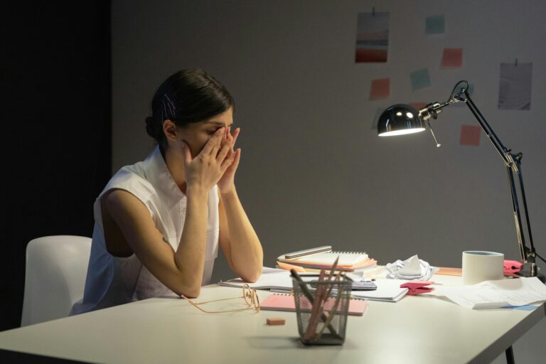 Very tired woman experiencing listener's fatigue
